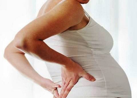 Как уменьшить боль в спине при беременности